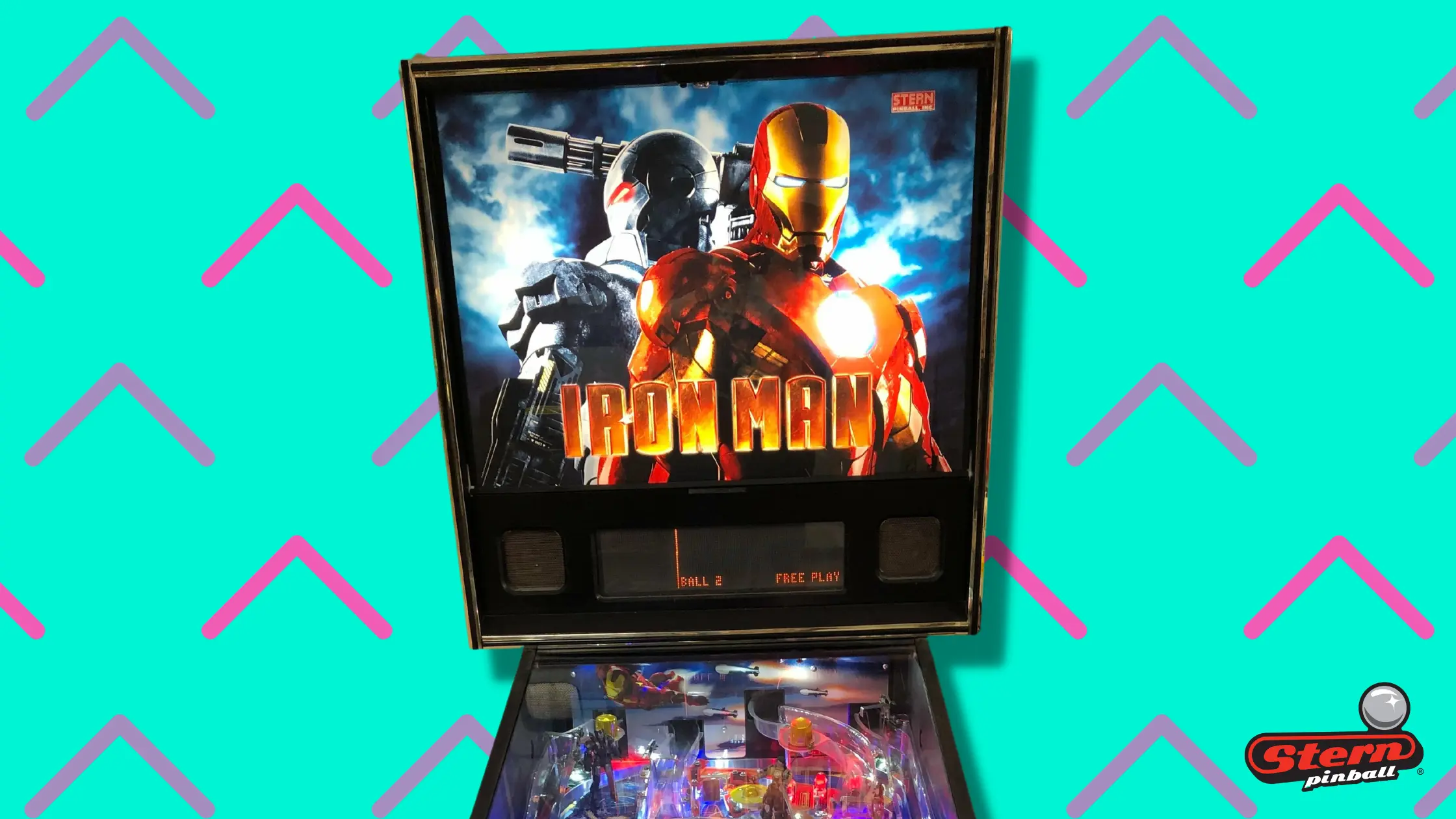 Iron Man pinball machine with red and gray superhero poster