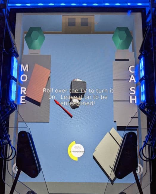 Interactive display encouraging TV interaction with 'More Cash' theme