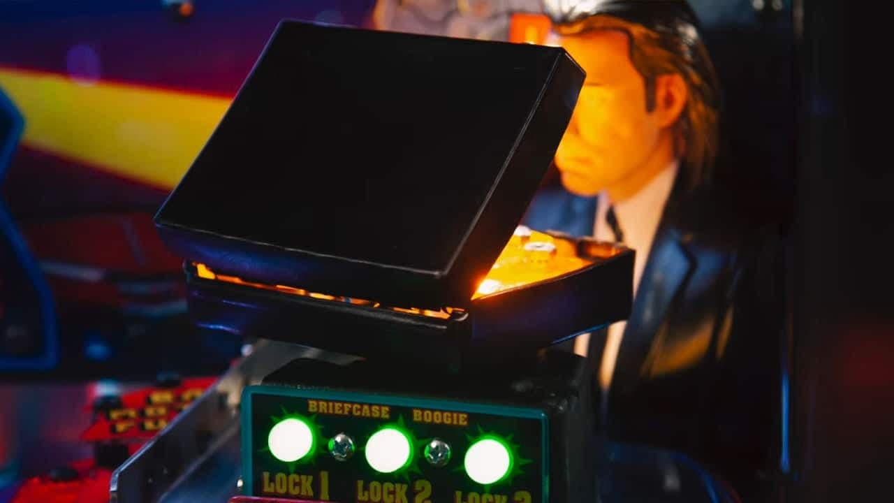 Briefcase Boogie control panel with glowing green lock indicators