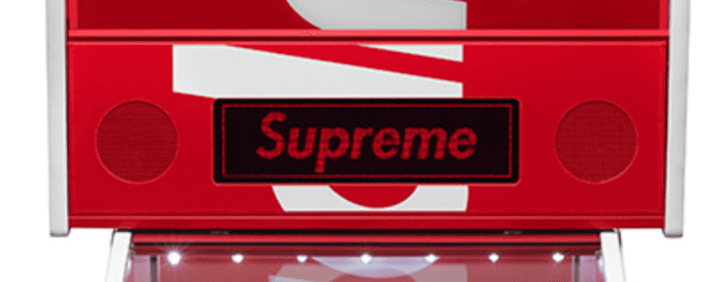 Red Supreme brand logo on minimalist design with geometric shapes